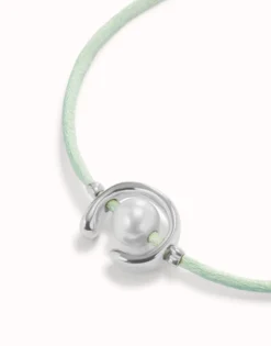 Blue green cord bracelet with a pearl