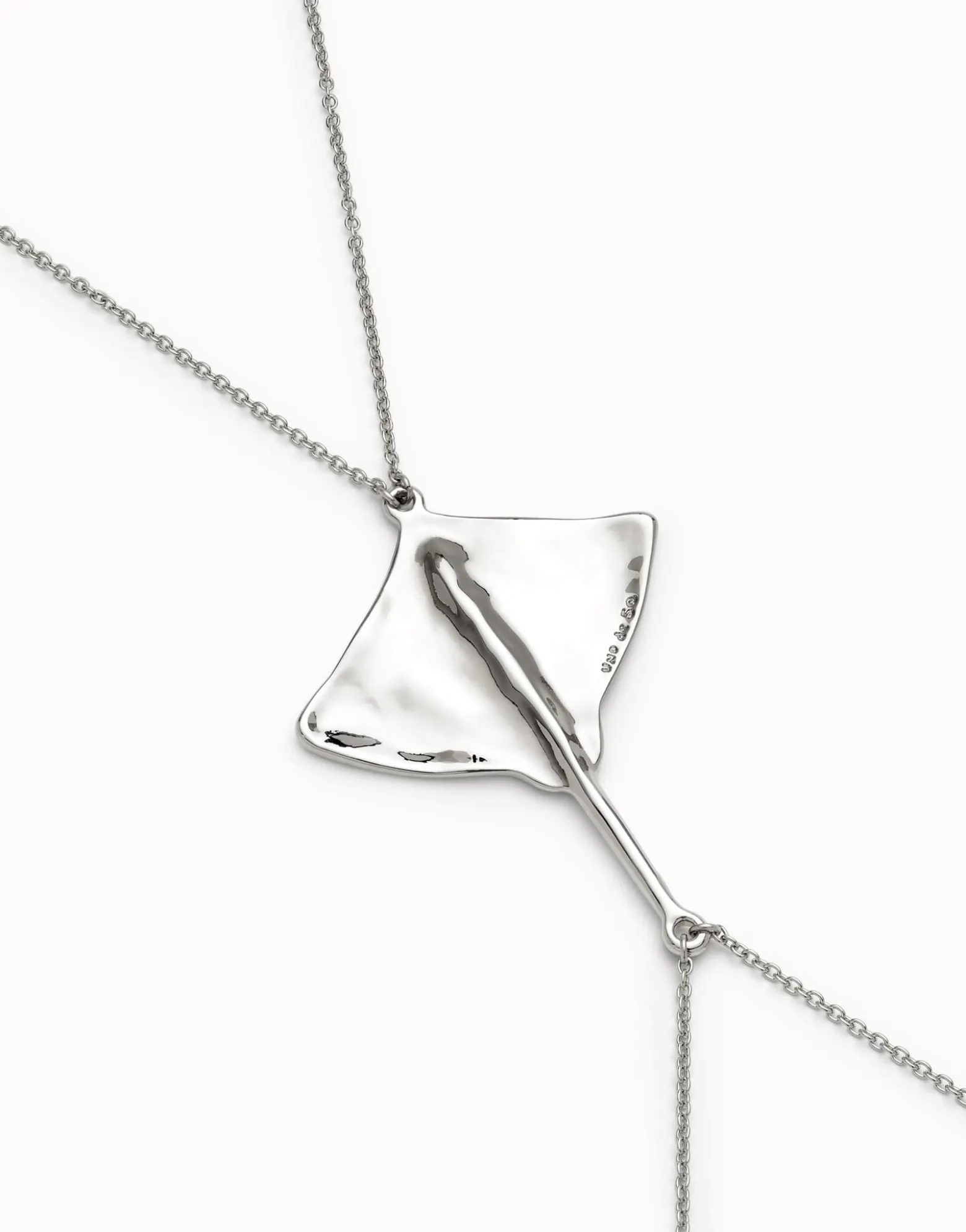 Body chain with manta ray