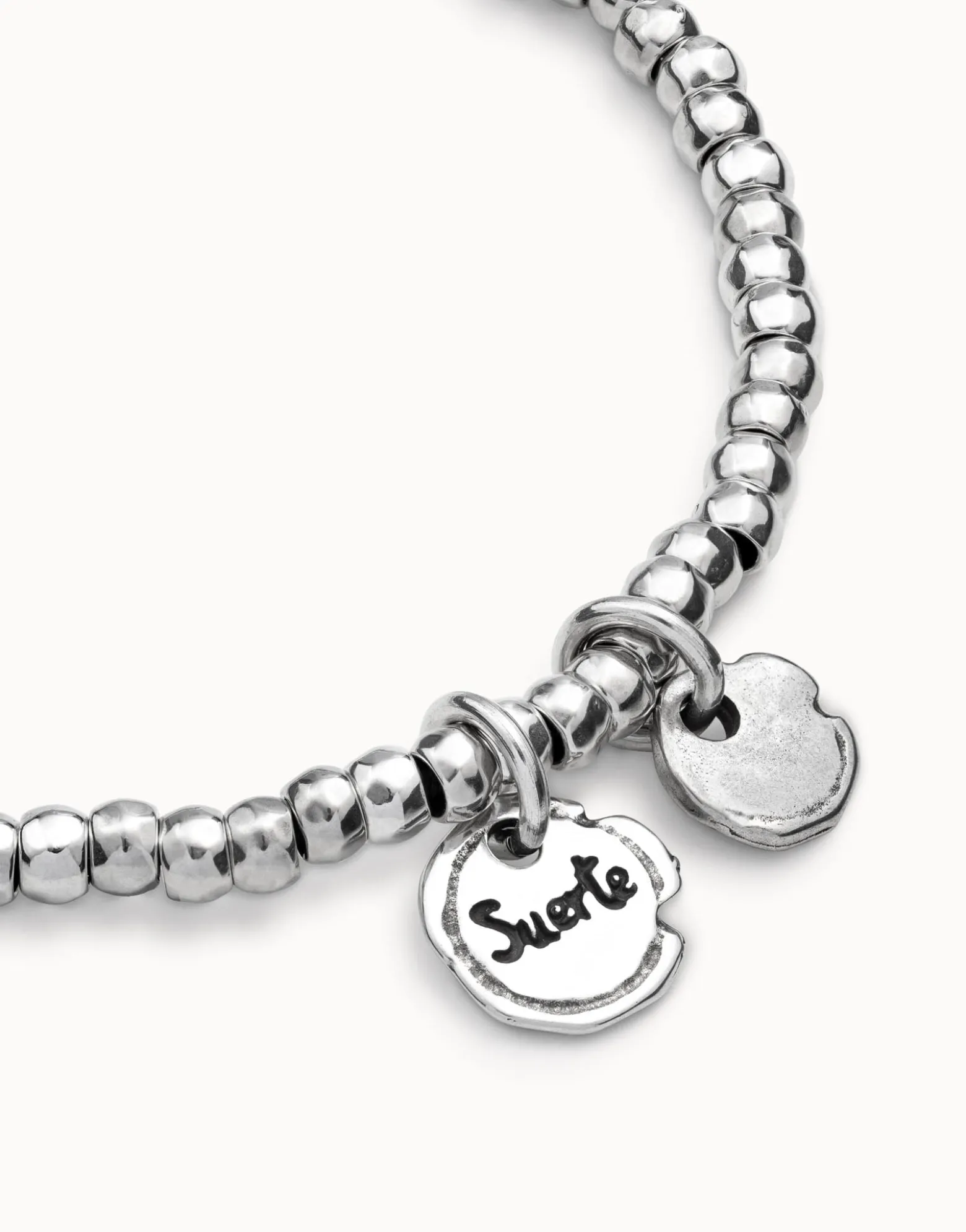 Bracelet with integrated charms