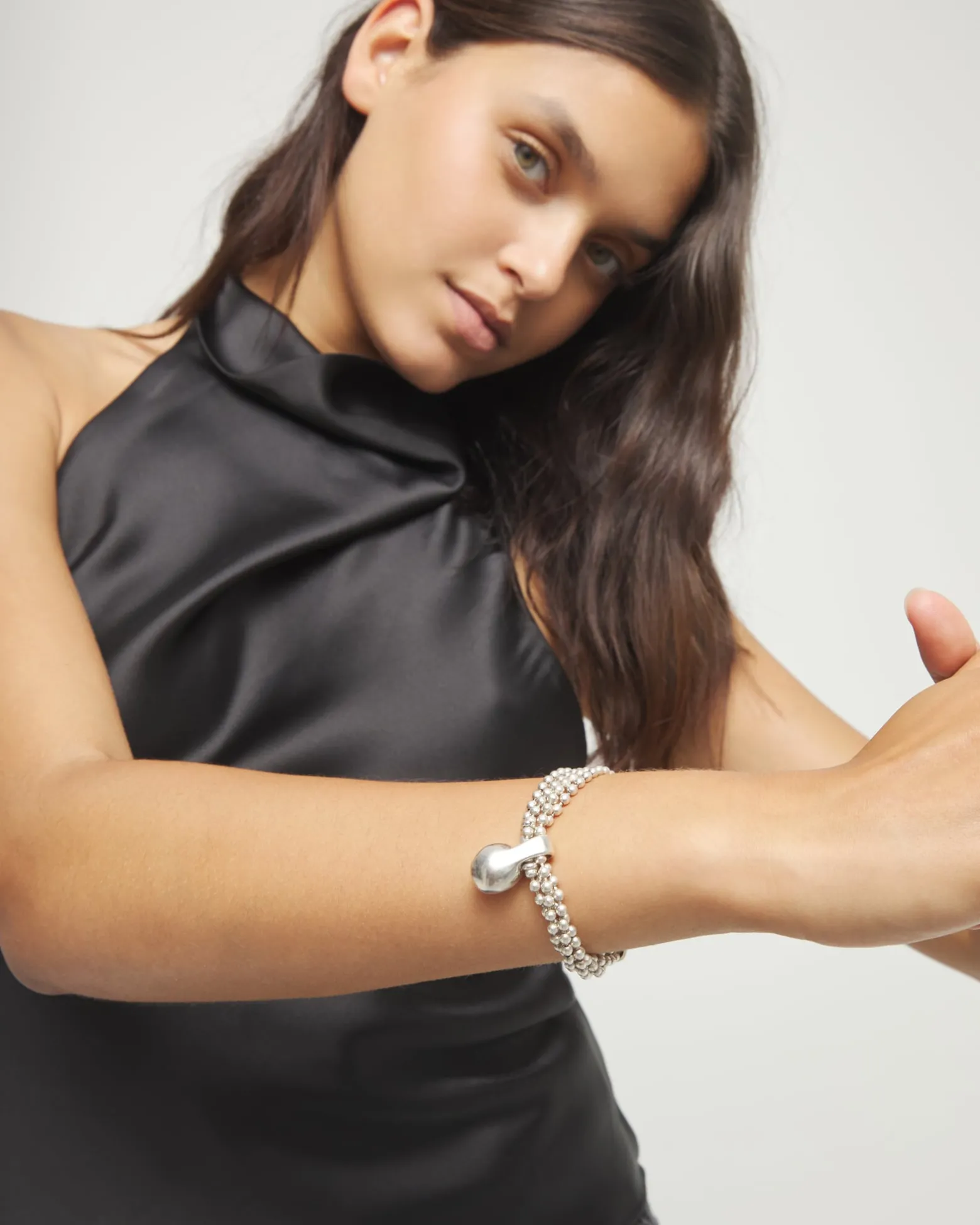 Bracelet with silver threads and large sphere