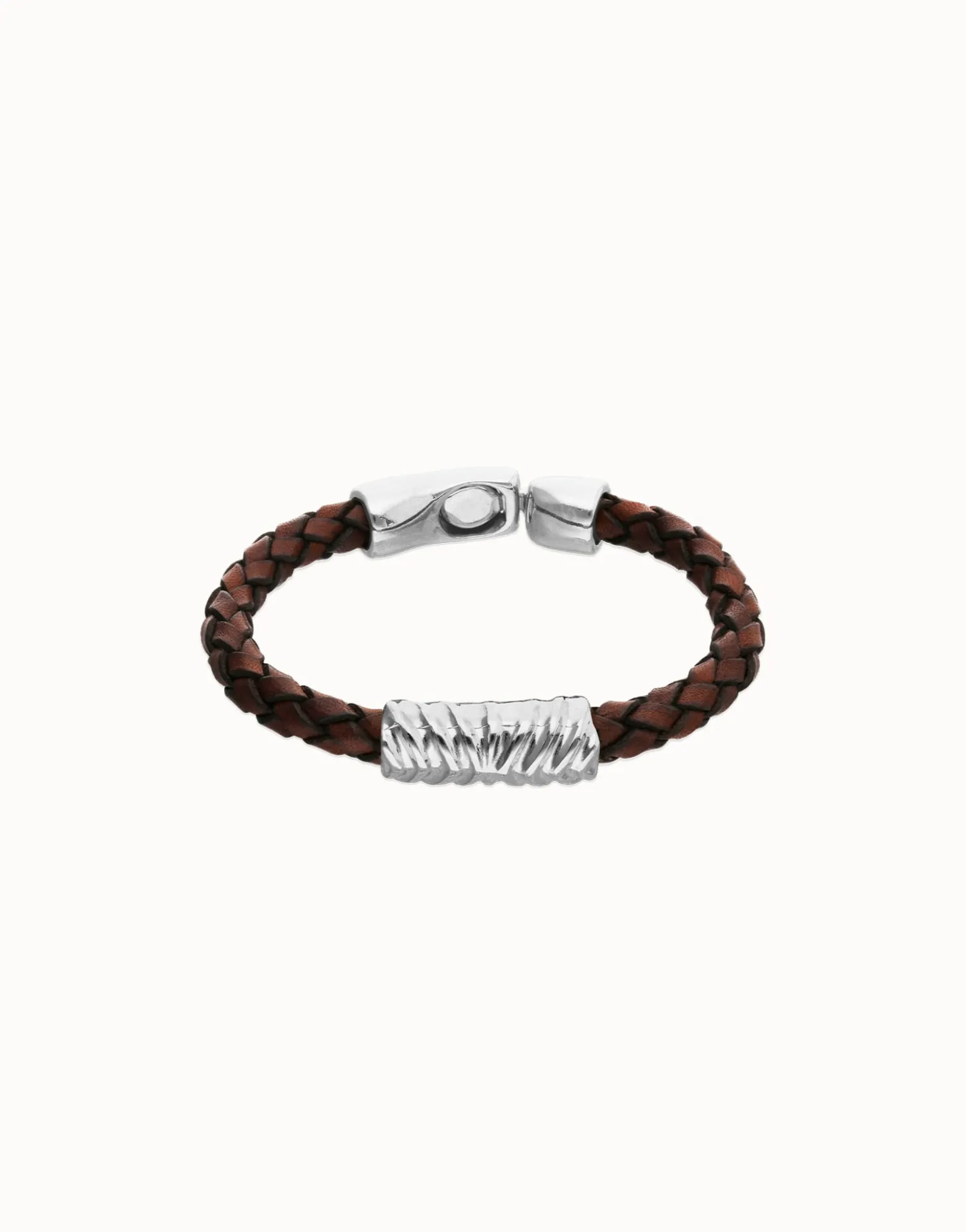Brown braided leather bracelet with a metal detail