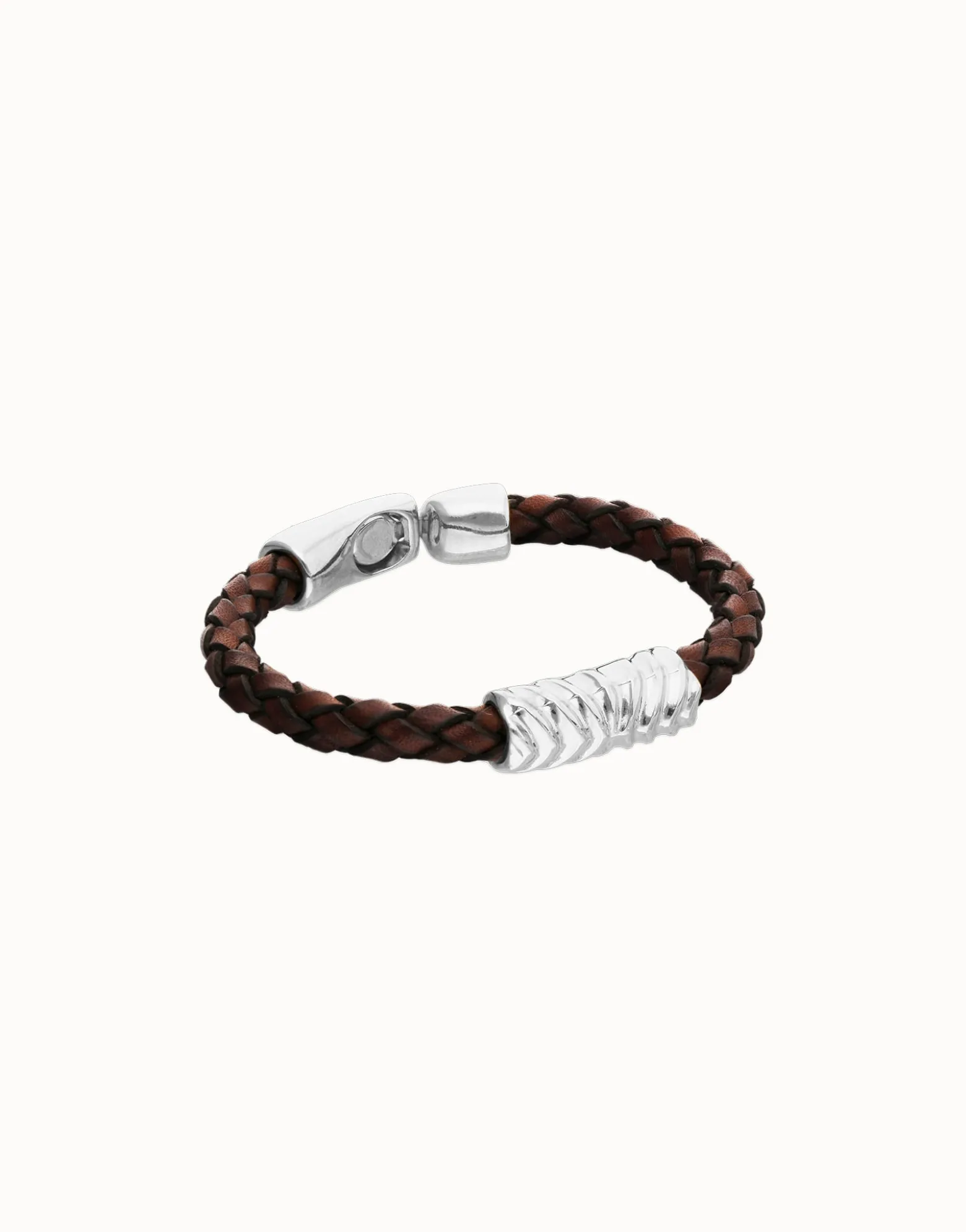 Brown braided leather bracelet with a metal detail