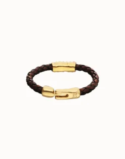 Brown braided leather bracelet with a metal detail