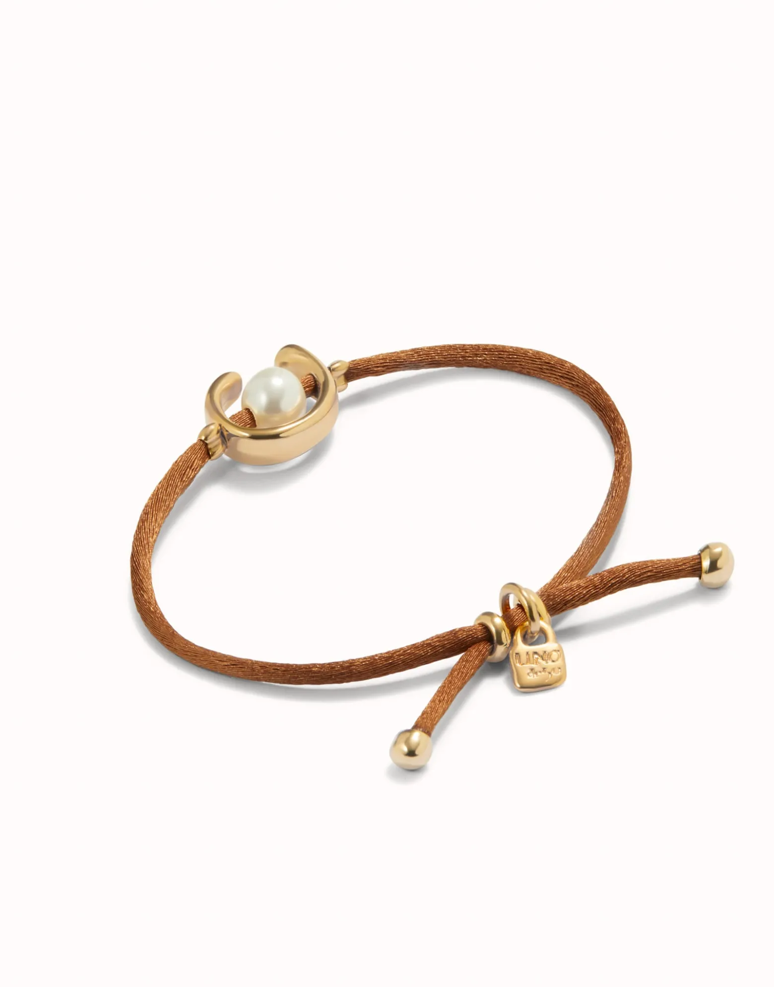 Brown cord bracelet with a pearl