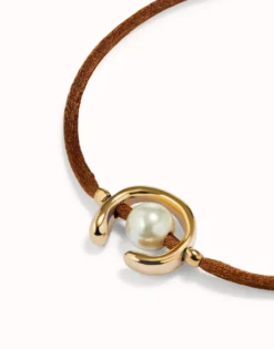 Brown cord bracelet with a pearl