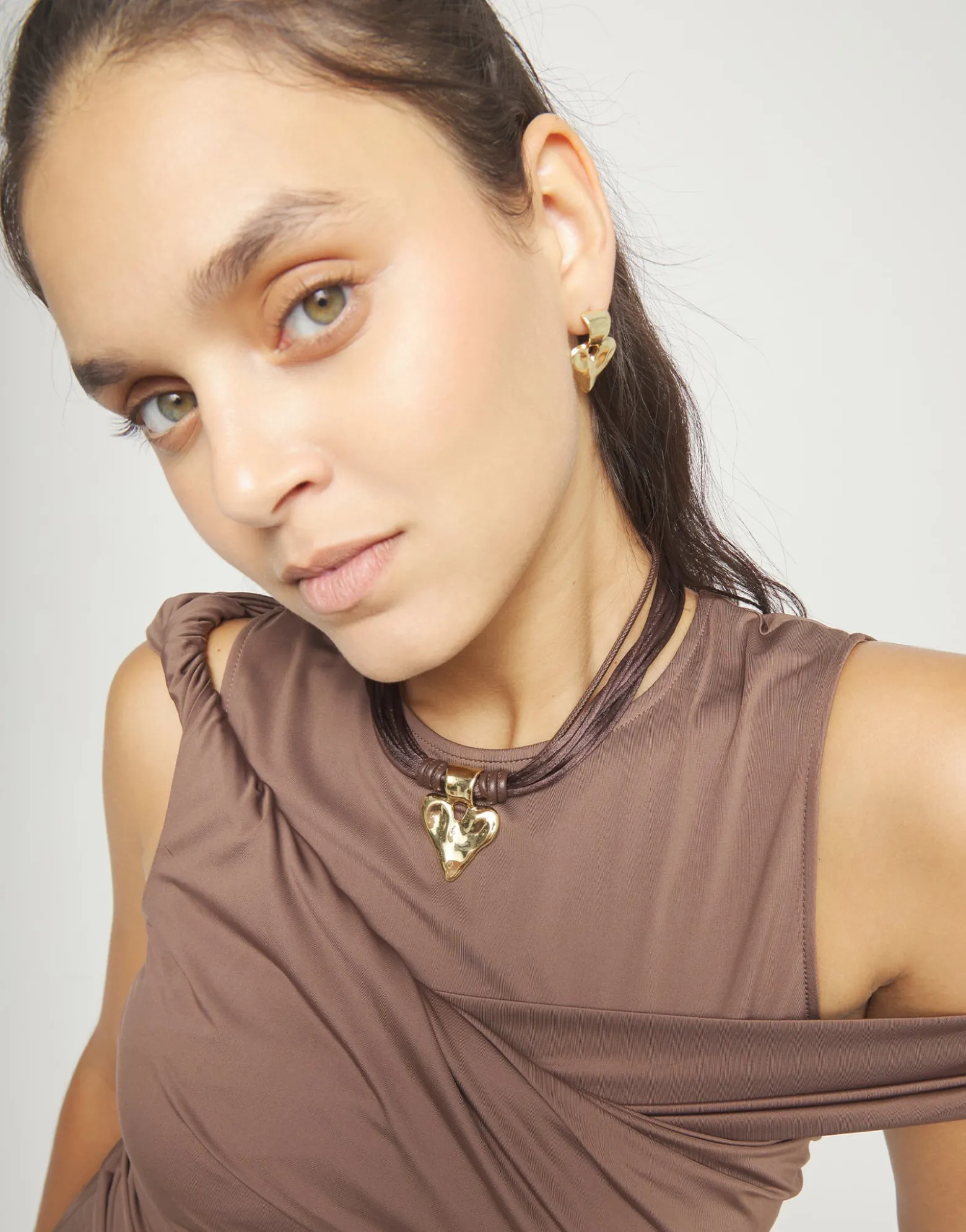 Brown leather and silk thread necklace with heart detail