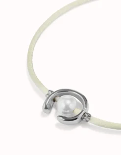 Cream cord bracelet with a pearl