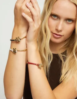 Cream leather bracelet with butterfly ornament