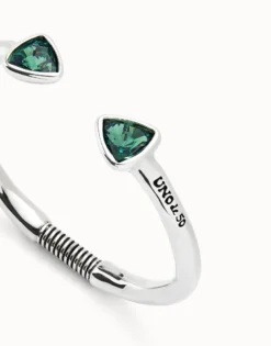 Cuff bracelet with two green crystals