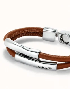 Double strand lether bracelet with two tubes