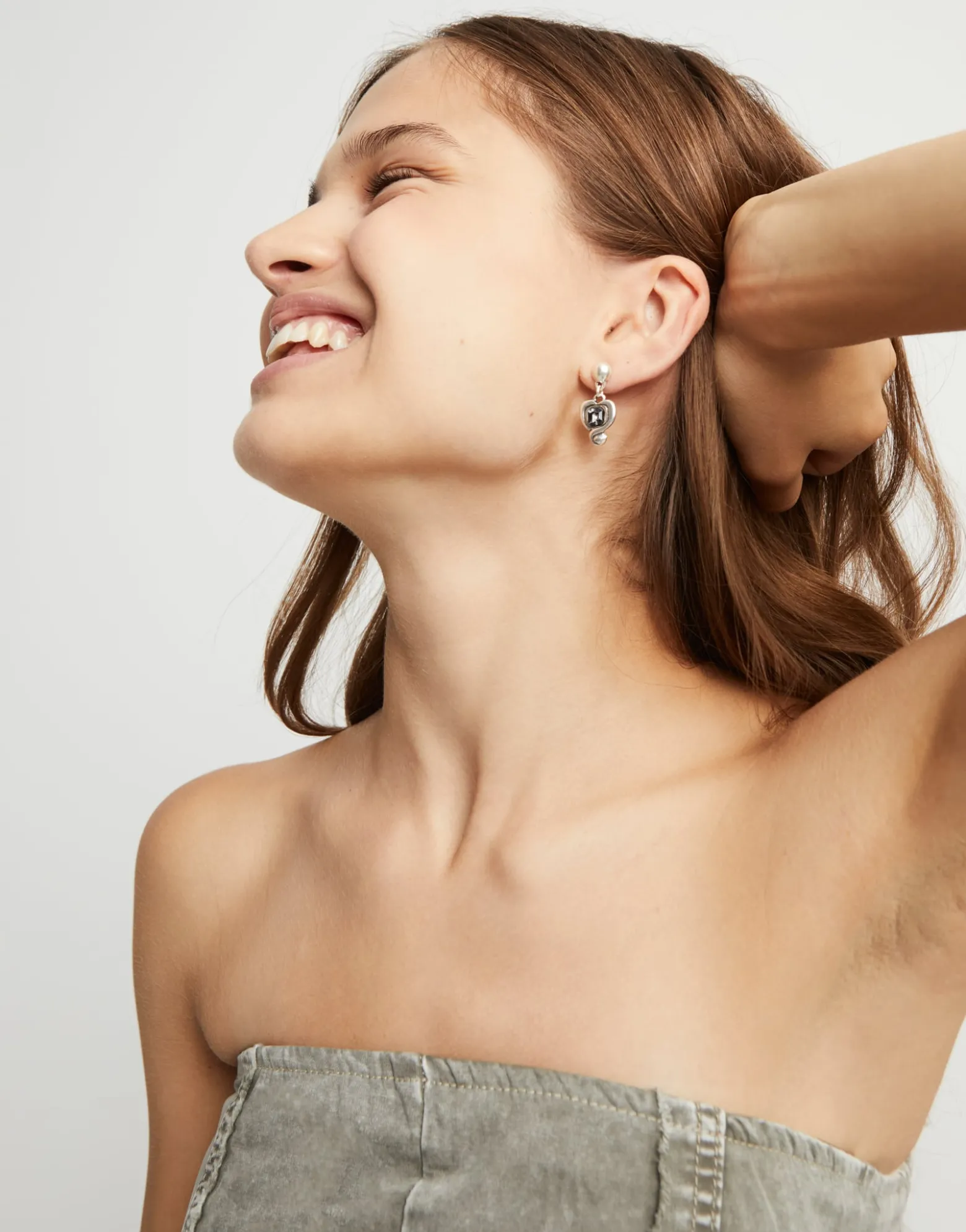 Drop earrings with a heart and black crystal