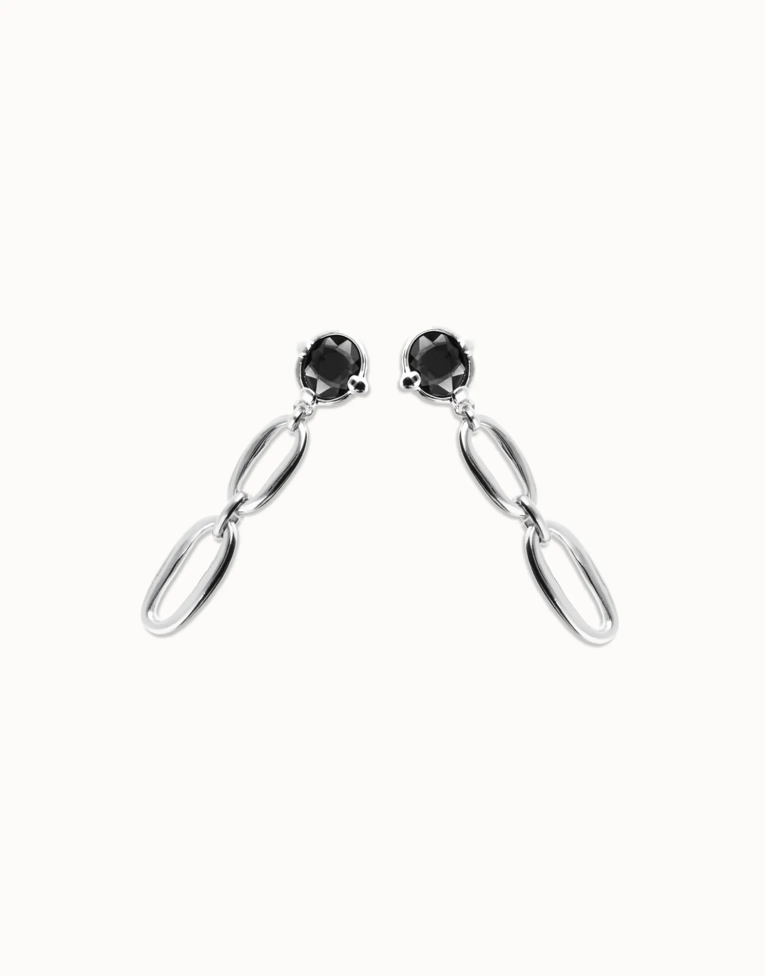 Drop earrings with faceted black crystal and links