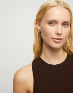 Drop earrings with leather and chained hearts