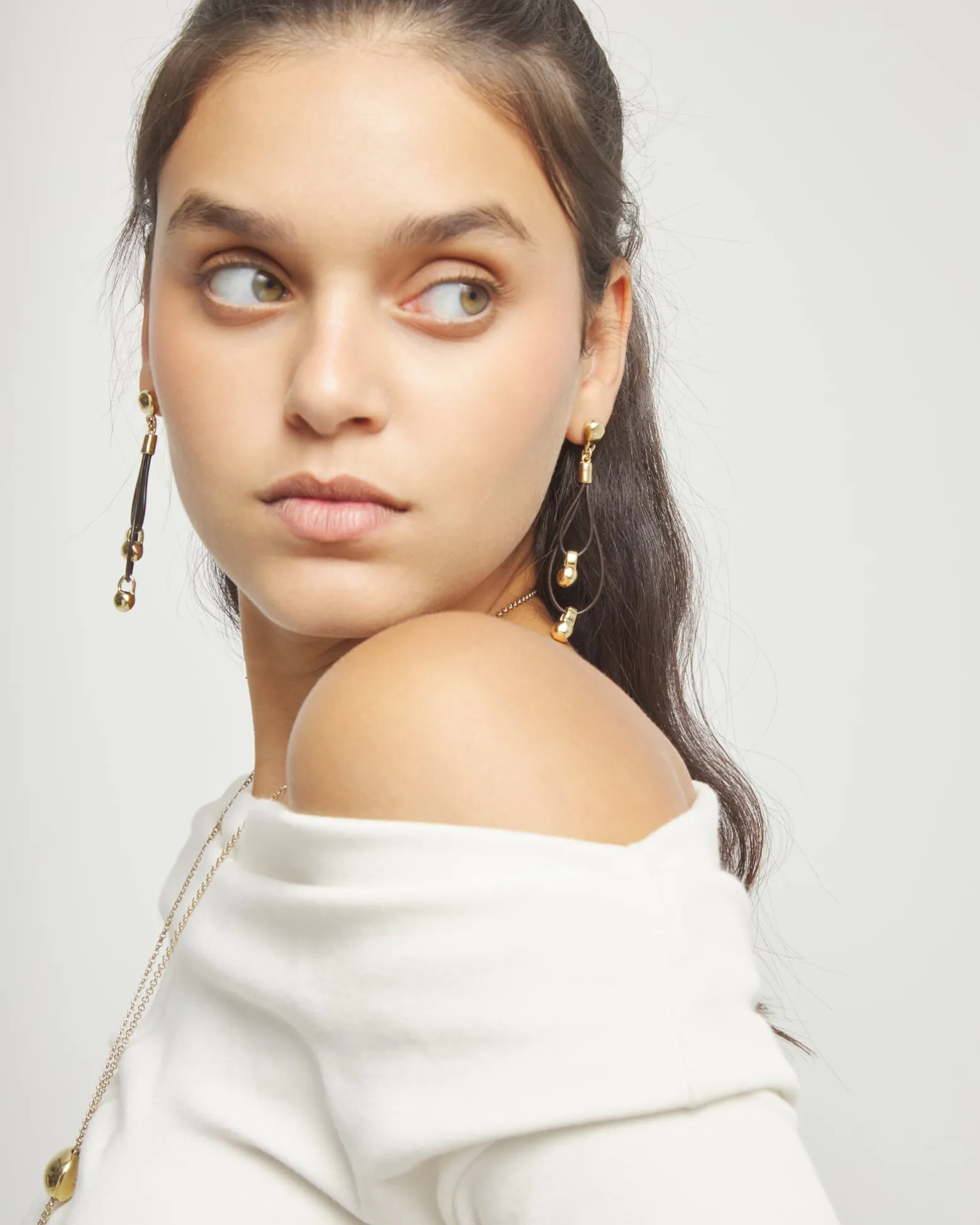 Drop earrings with leather earrings and sphere detail