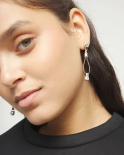 Drop leather earrings with sphere detail