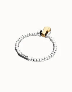 Elastic beaded bracelet with small and large beads
