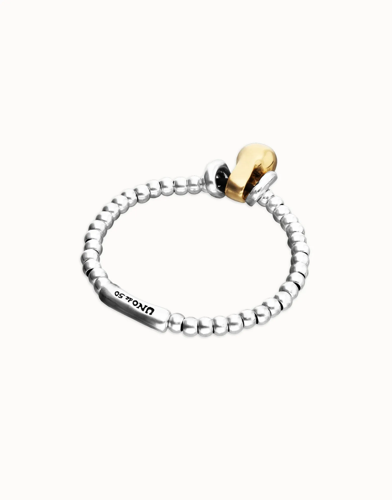 Elastic beaded bracelet with small and large beads