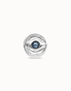 Eye-shaped ring with faceted blue crystal