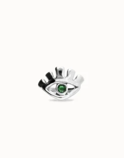 Eye-shaped ring with faceted green crystal