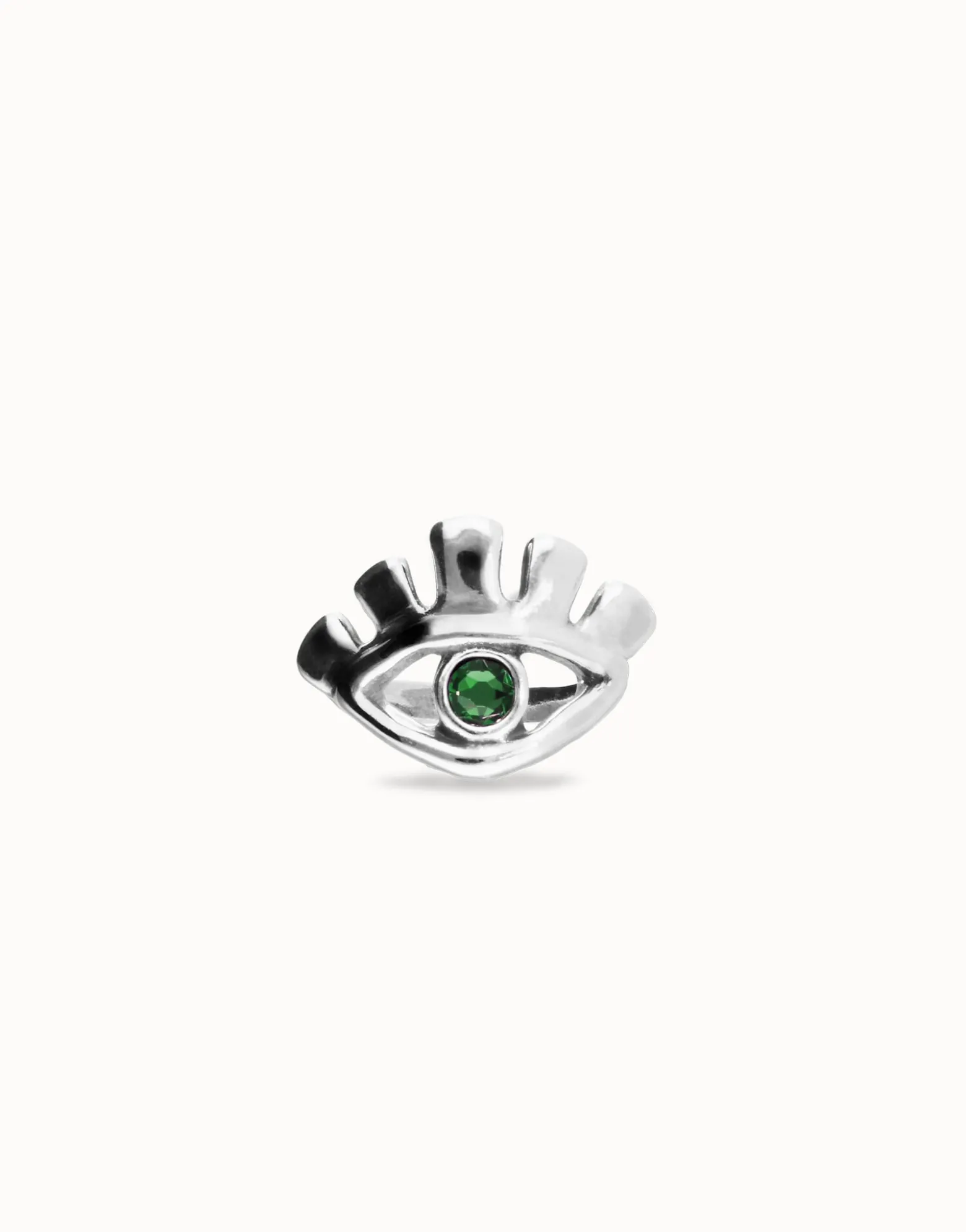 Eye-shaped ring with faceted green crystal