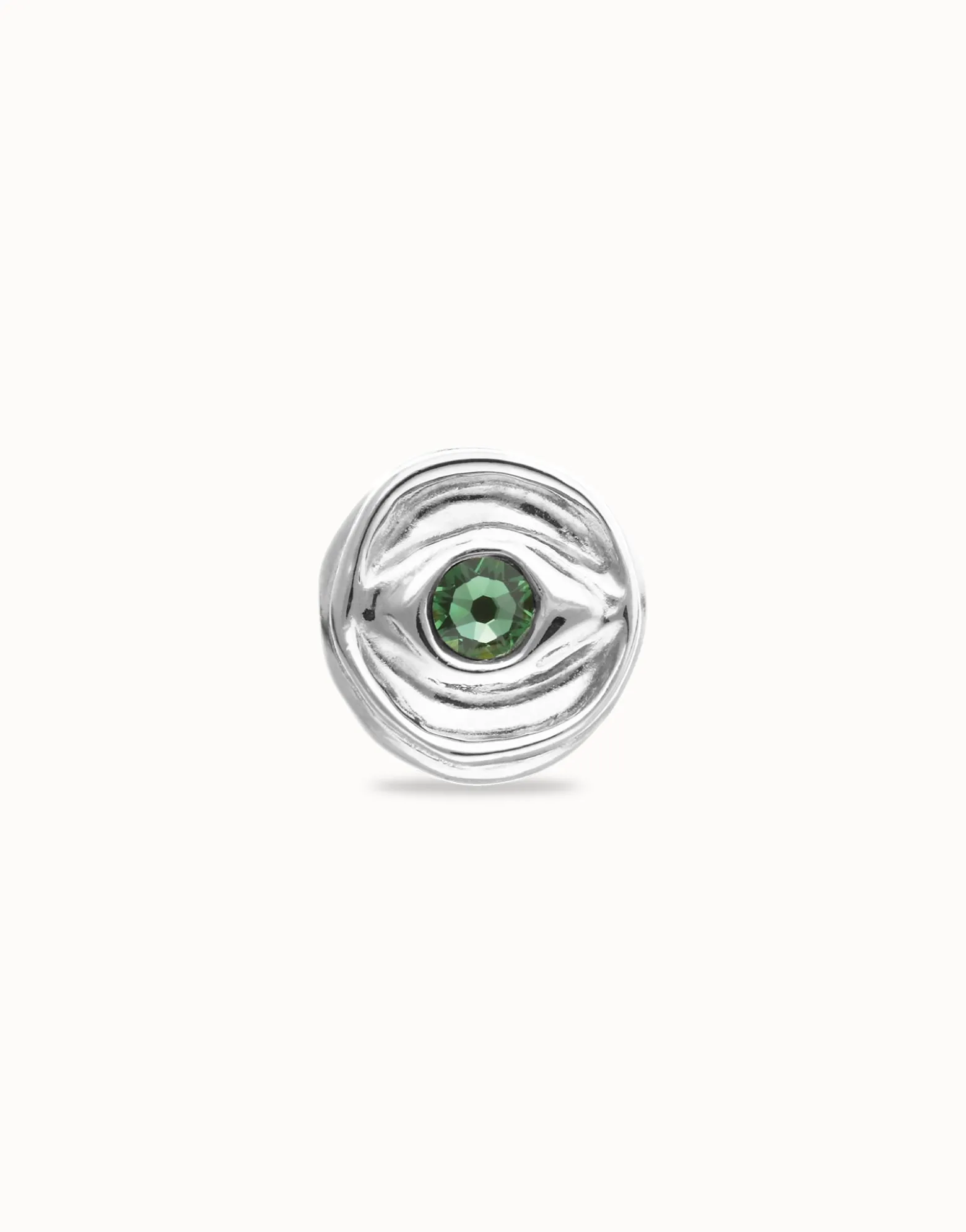 Eye-shaped signet ring with faceted green crystal