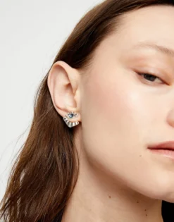 Eye-shaped stud earrings with blue crystal