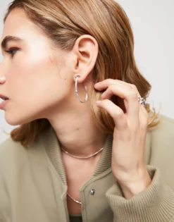 Hoop earrings with white topaz