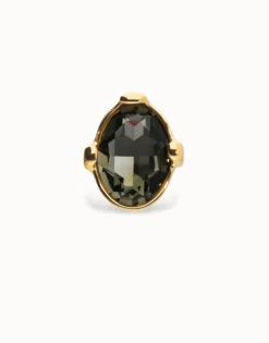Large ring with oval faceted gray crystal