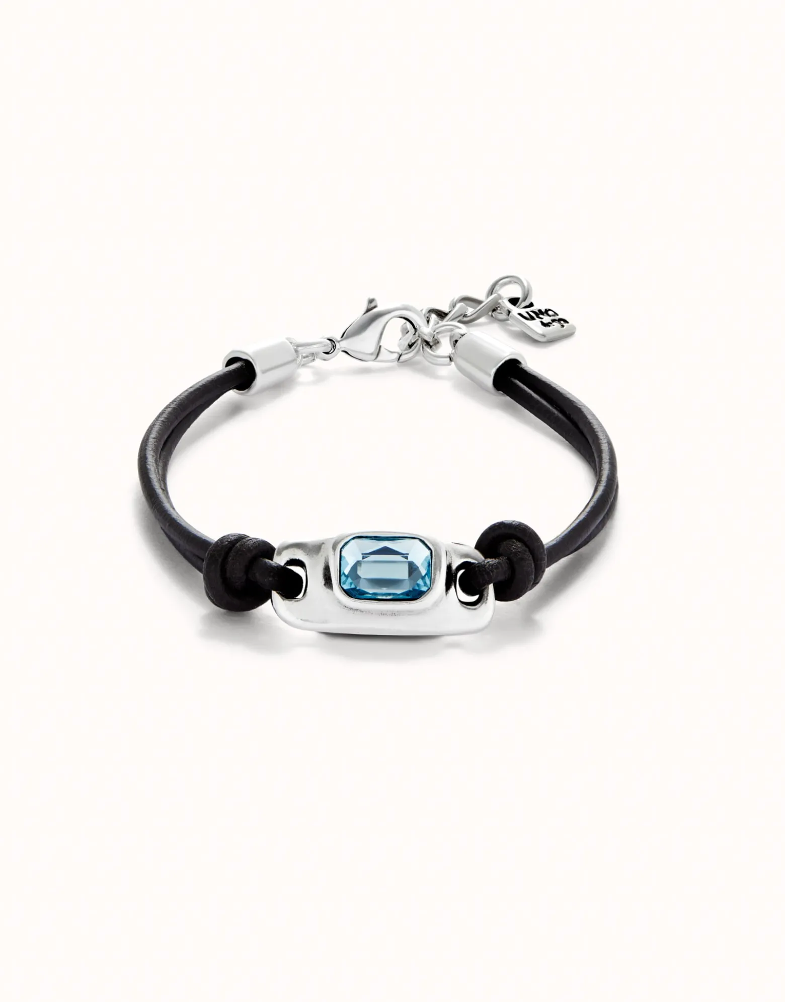 Leather bracelet with a blue crystal