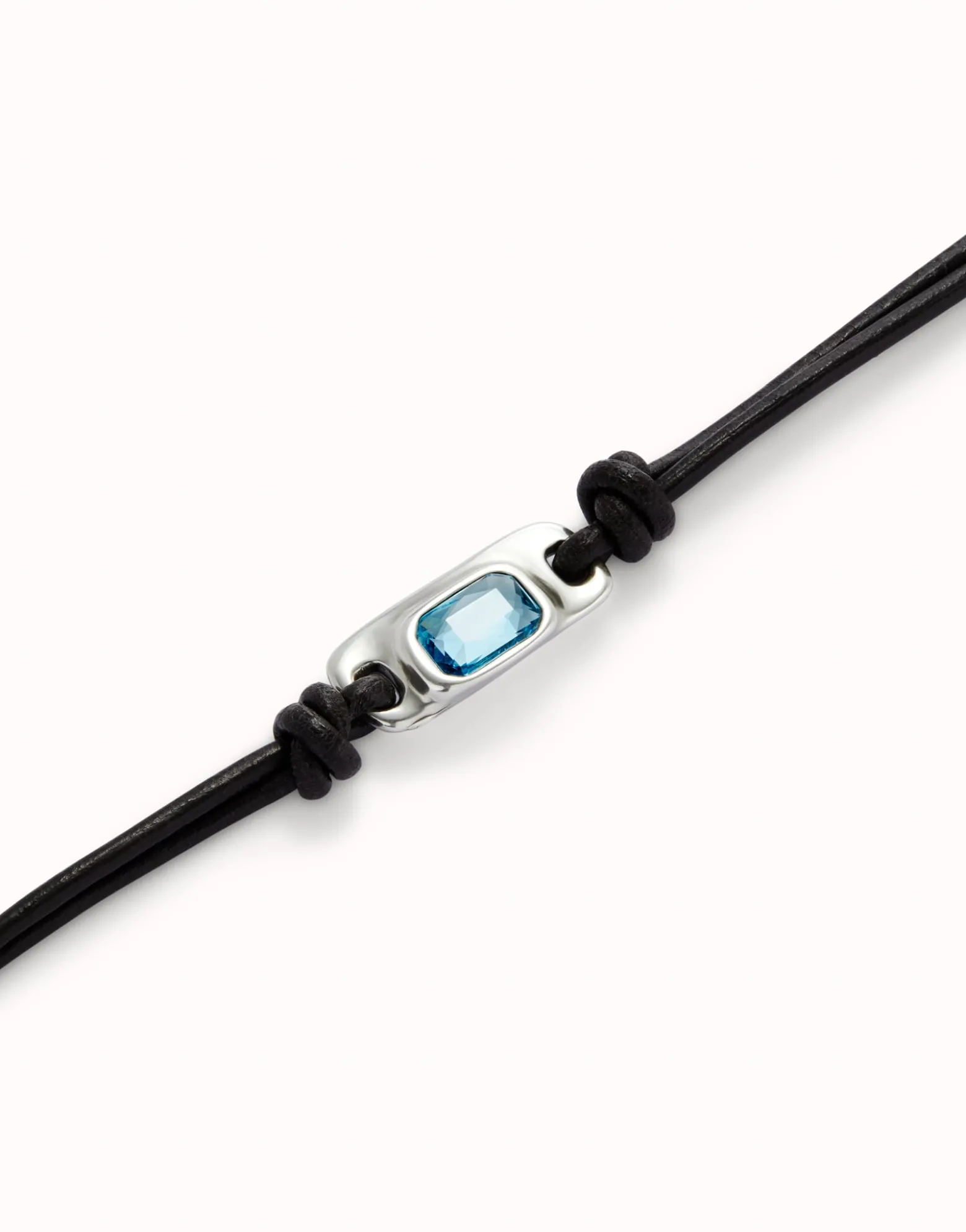 Leather bracelet with a blue crystal