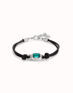 Leather bracelet with a green crystal