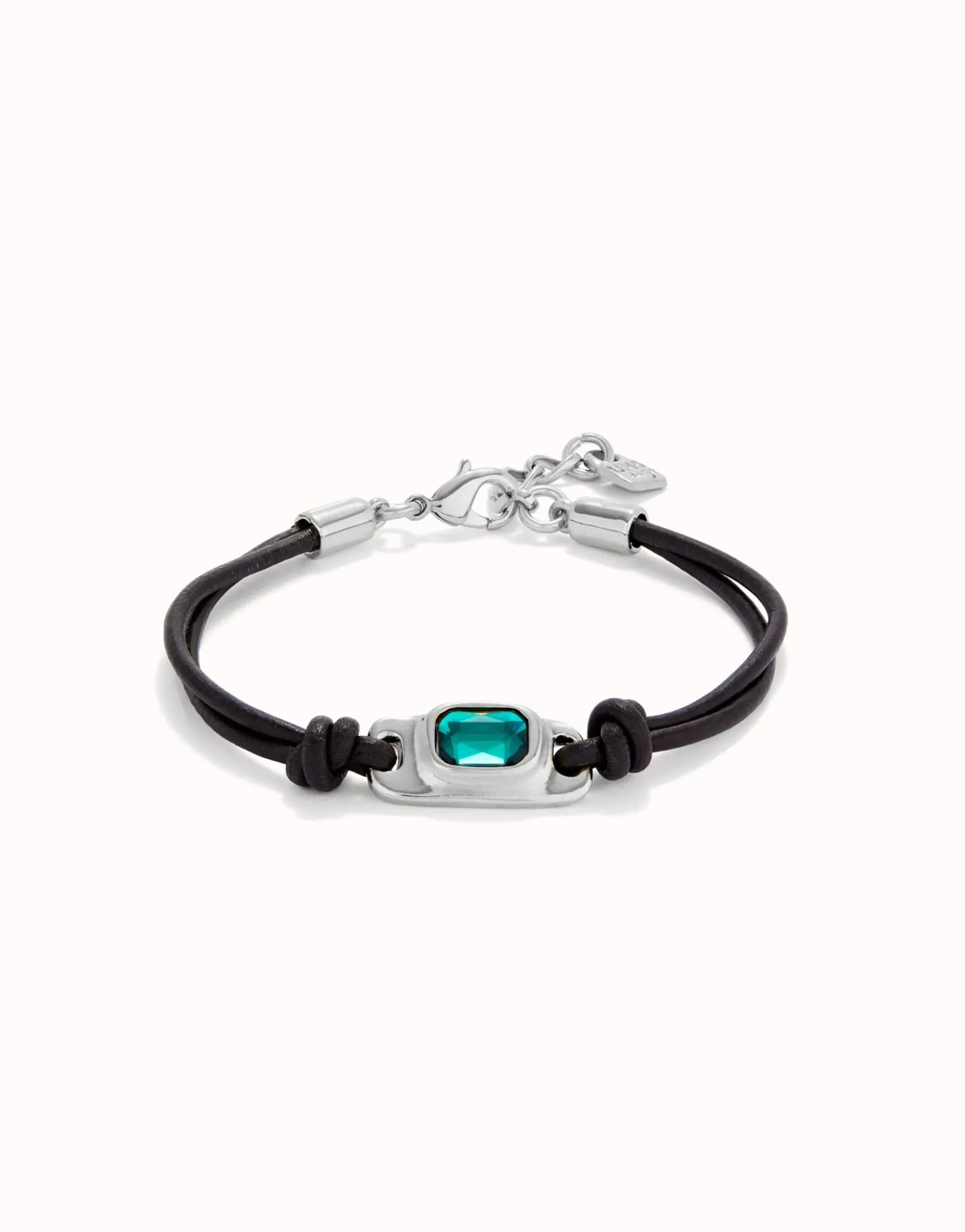 Leather bracelet with a green crystal