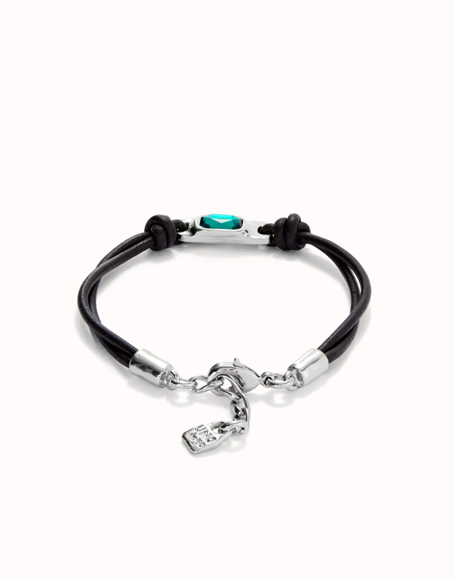 Leather bracelet with a green crystal