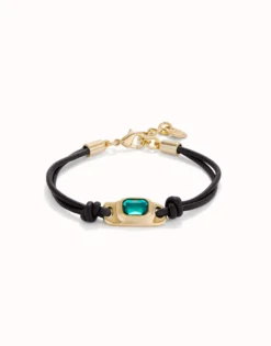 Leather bracelet with a green crystal
