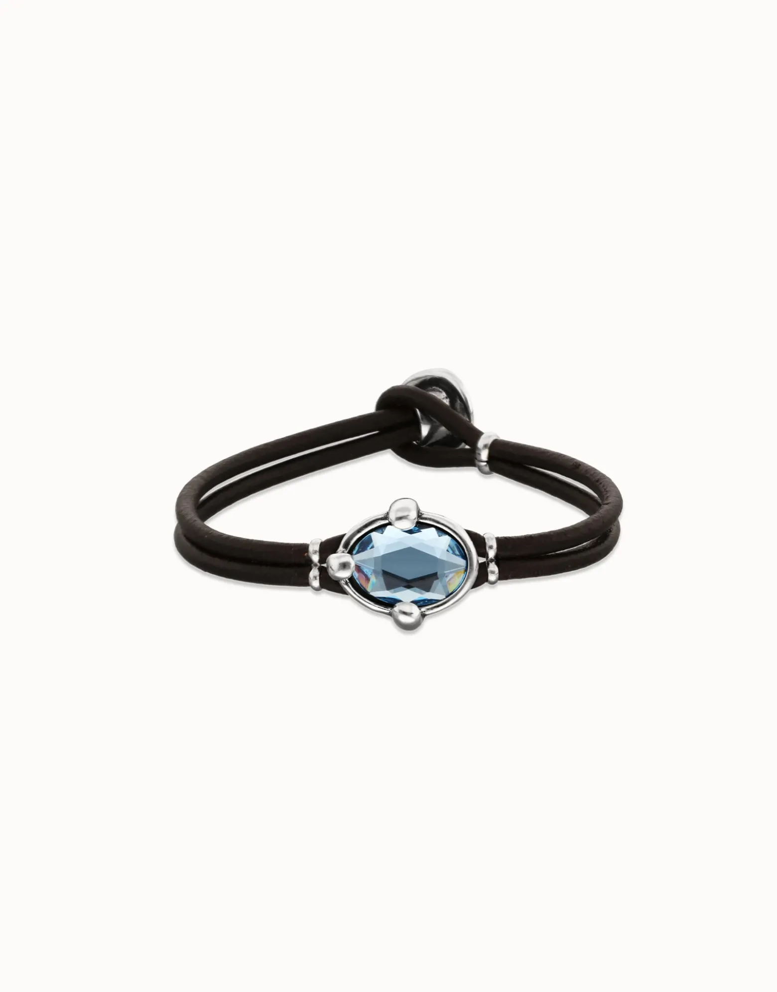 Leather bracelet with blue oval faceted crystal