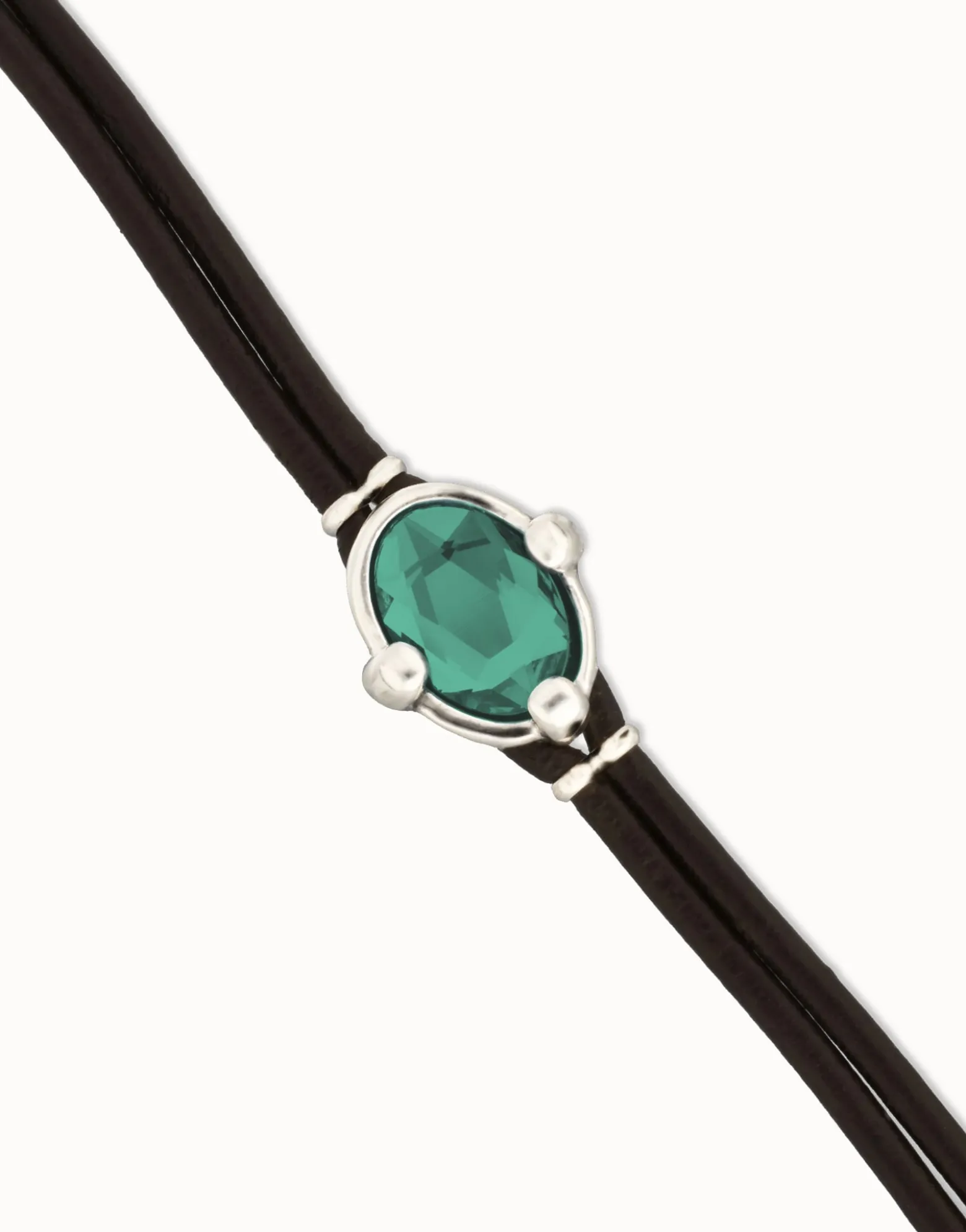 Leather bracelet with green oval faceted crystal