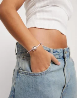Lilac cord bracelet with a pearl