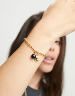 Link chain bracelet with heart charm and murano glass