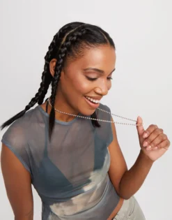 Long beaded chain charm necklace