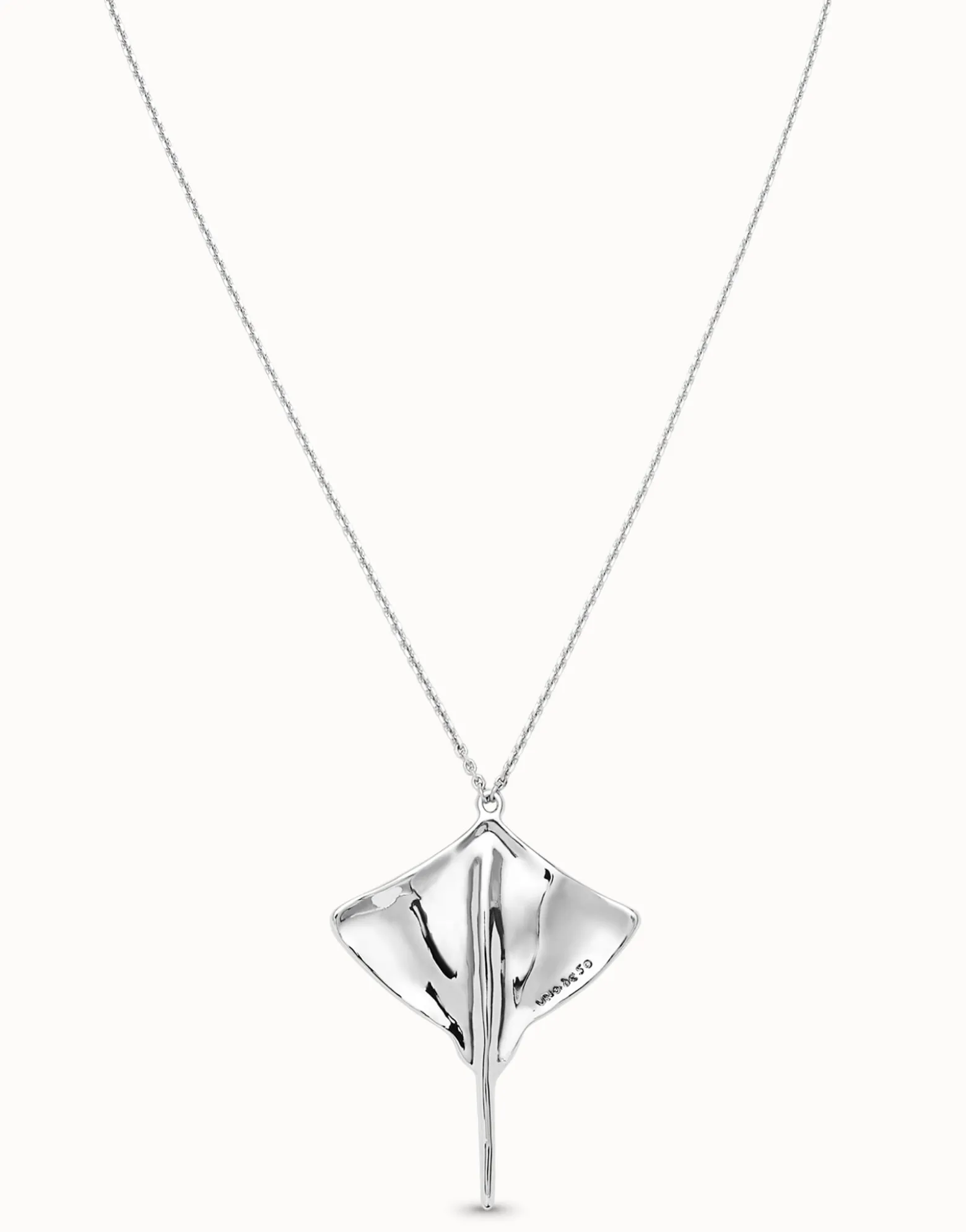 Long chain pendant necklace with manta ray