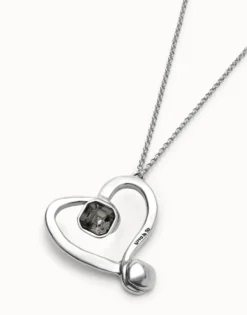 Long chain pendant necklace with a large heart
