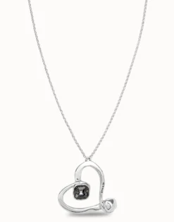 Long chain pendant necklace with a large heart