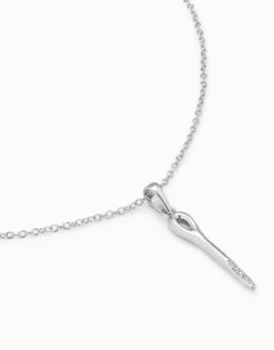 Long chain pendant necklace with needle