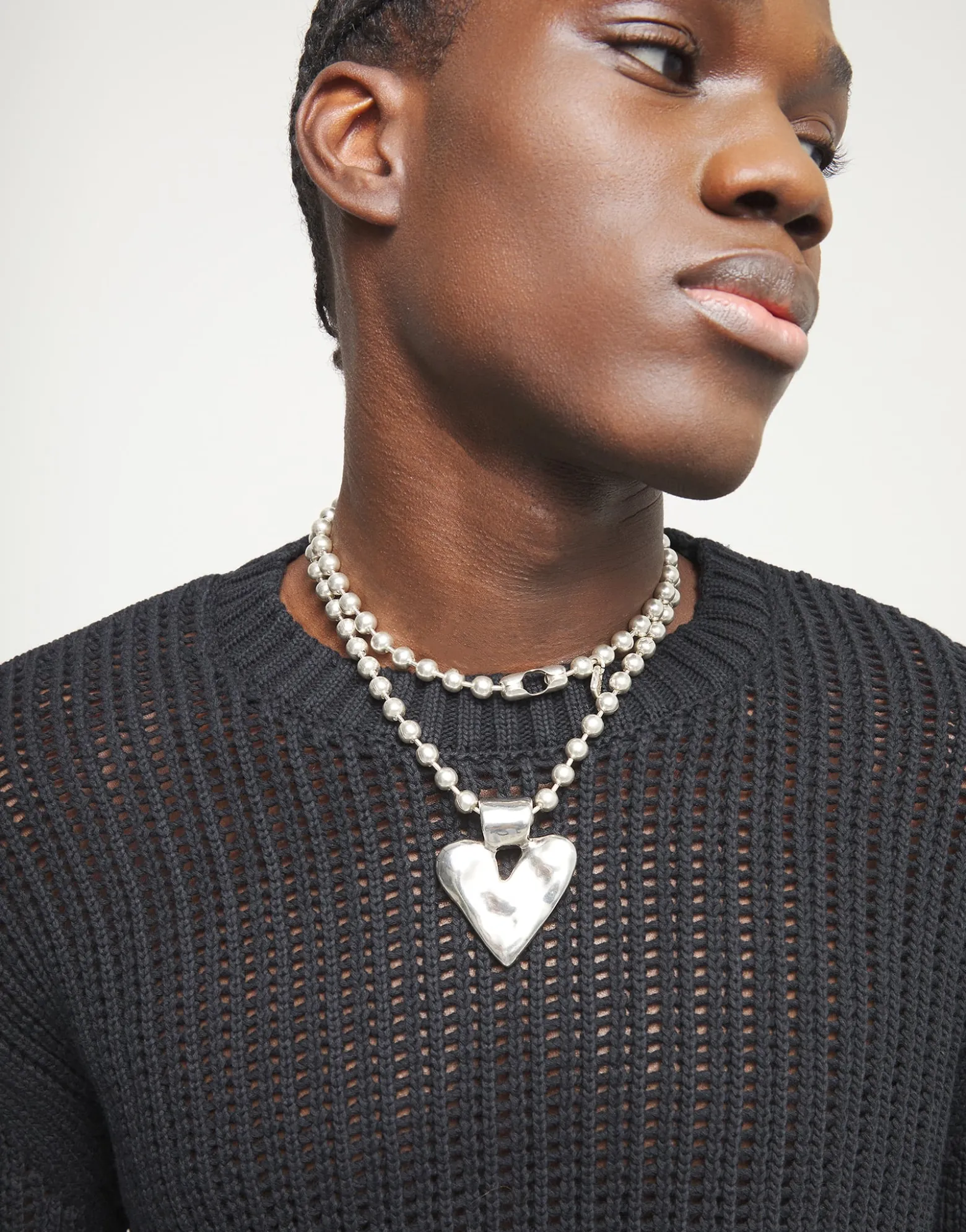 Long necklace with beads and heart detail