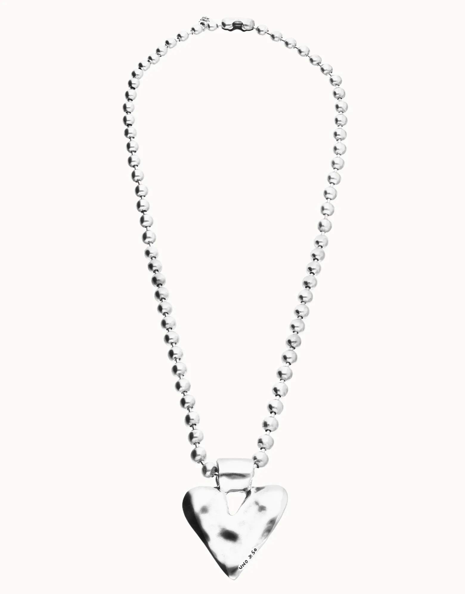 Long necklace with beads and heart detail