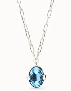 Long necklace with large blue oval faceted crystal