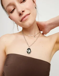 Long necklace with large gray oval faceted crystal