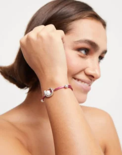 Mauve cord bracelet with a pearl