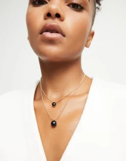 Multi-layer pendant link necklace with black murano glass