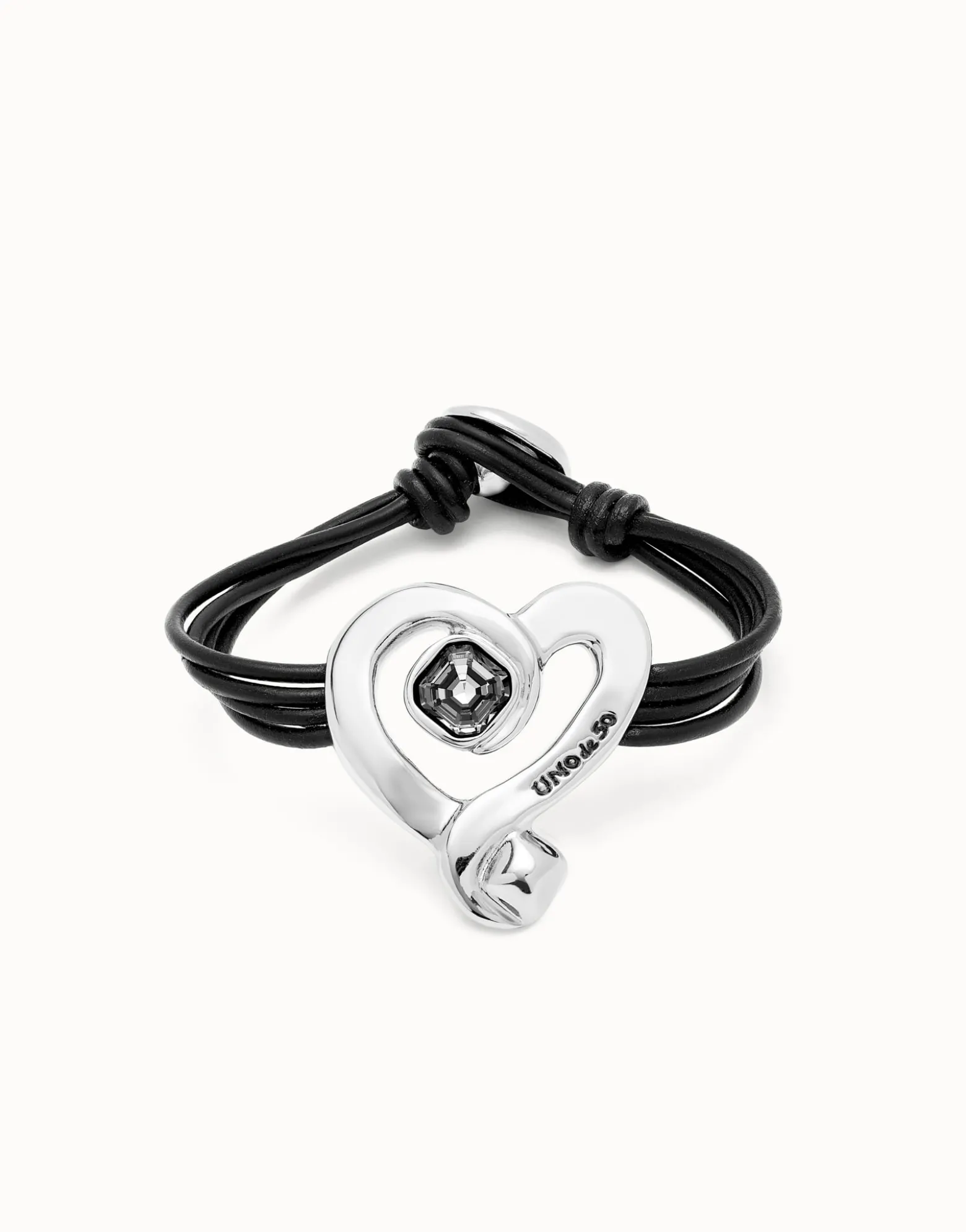 Multi strand leather bracelet with a heart